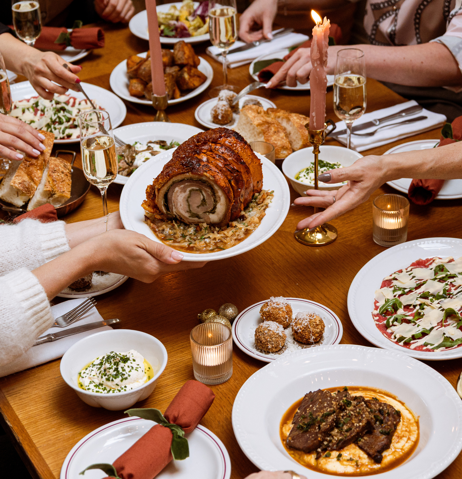 Sharing christmas plates at a restaurant in central London